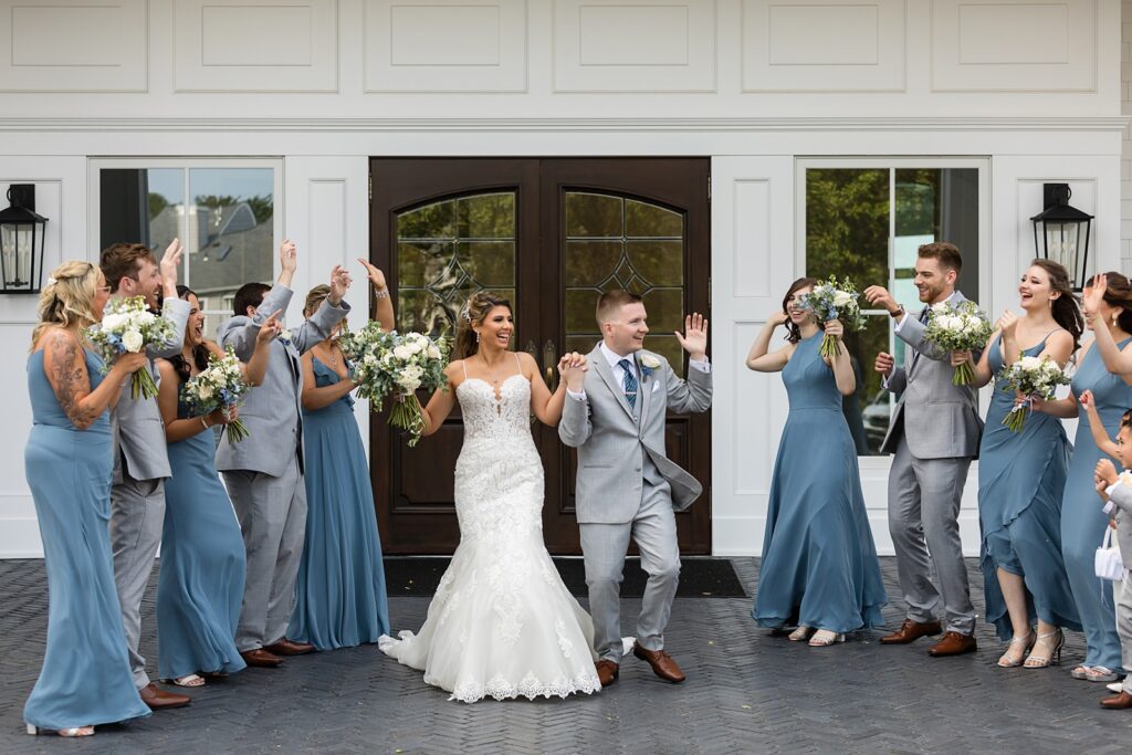 Bride and groom walking out of Clarks Landing wedding venue